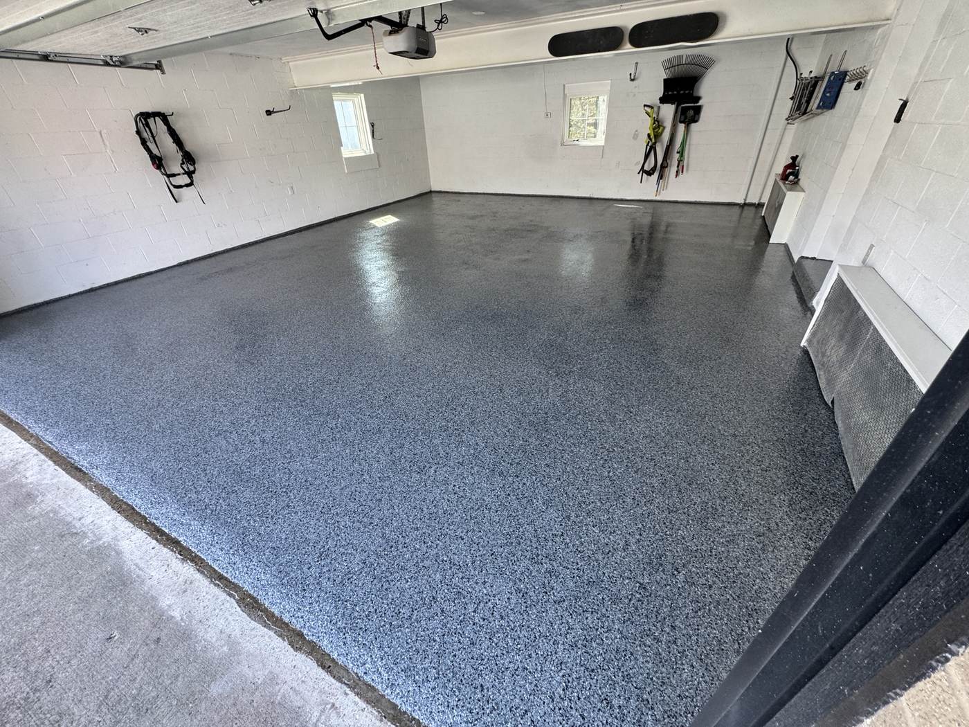 Gray broadcast flake garage floor