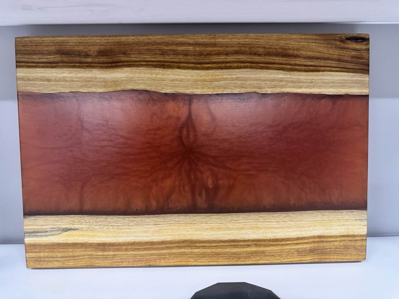 Red resin and wood board